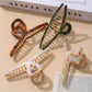 Beau - Elegant Large Cross Design Claw Clip