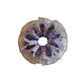 Gifty scrunchie styled on a wrist with visible lace and polka dot details