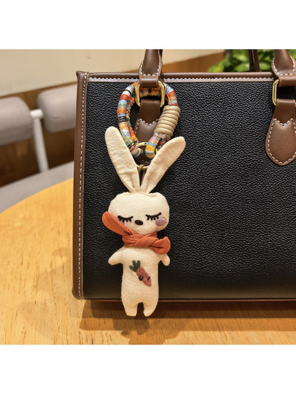 Vintage rabbit charm keychain displayed on a white background