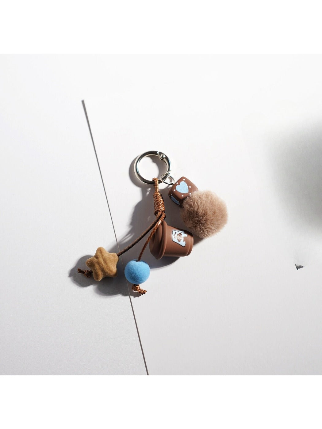 Brown tone cartoon keychain attached to a set of keys