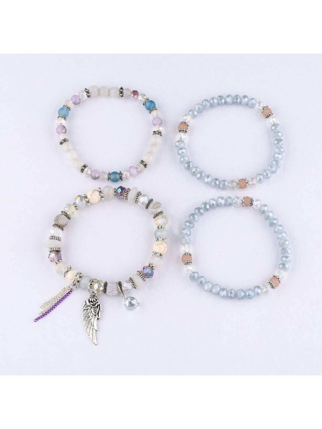 Side view of Lovra vintage layered beaded bracelet showing multiple strands