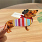 Beau dachshund claw clip displayed alongside other hair accessories