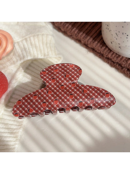 Top view of Beau plaid hair claw clip with red strawberry print