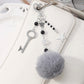 Keypus - Y2K Fuzz Ball and Cross Design Keychain