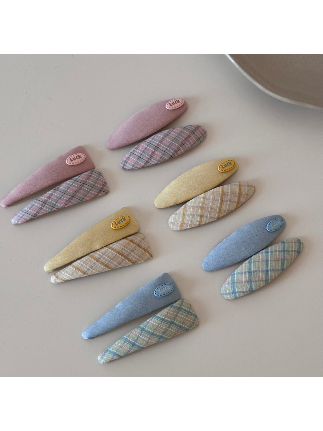 Close-up of Beau oval hair clip showing vibrant color pattern and smooth finish