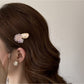 Close-up of pink beads arranged on the Beau Sweet Pink Beaded Hair Clip