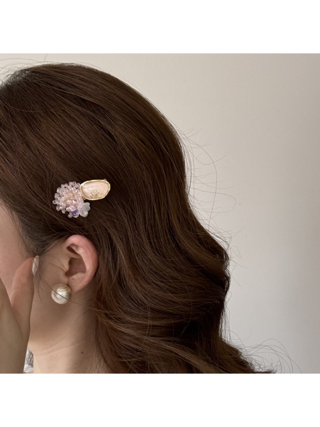 Close-up of pink beads arranged on the Beau Sweet Pink Beaded Hair Clip