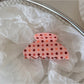 Beau hair clip open to show metal spring clasp and teeth