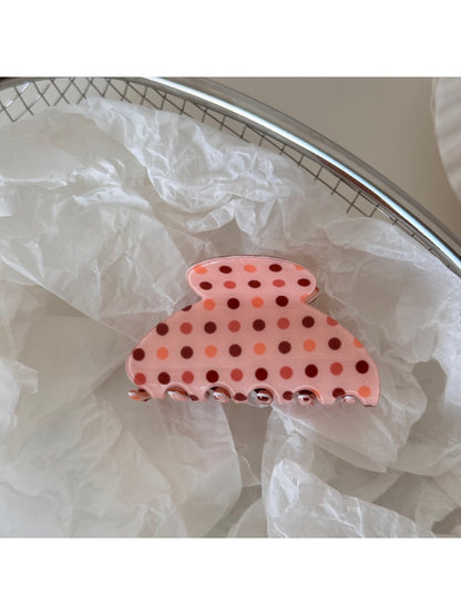 Beau hair clip open to show metal spring clasp and teeth