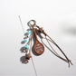 Brown tone cartoon keychain shown from the back side