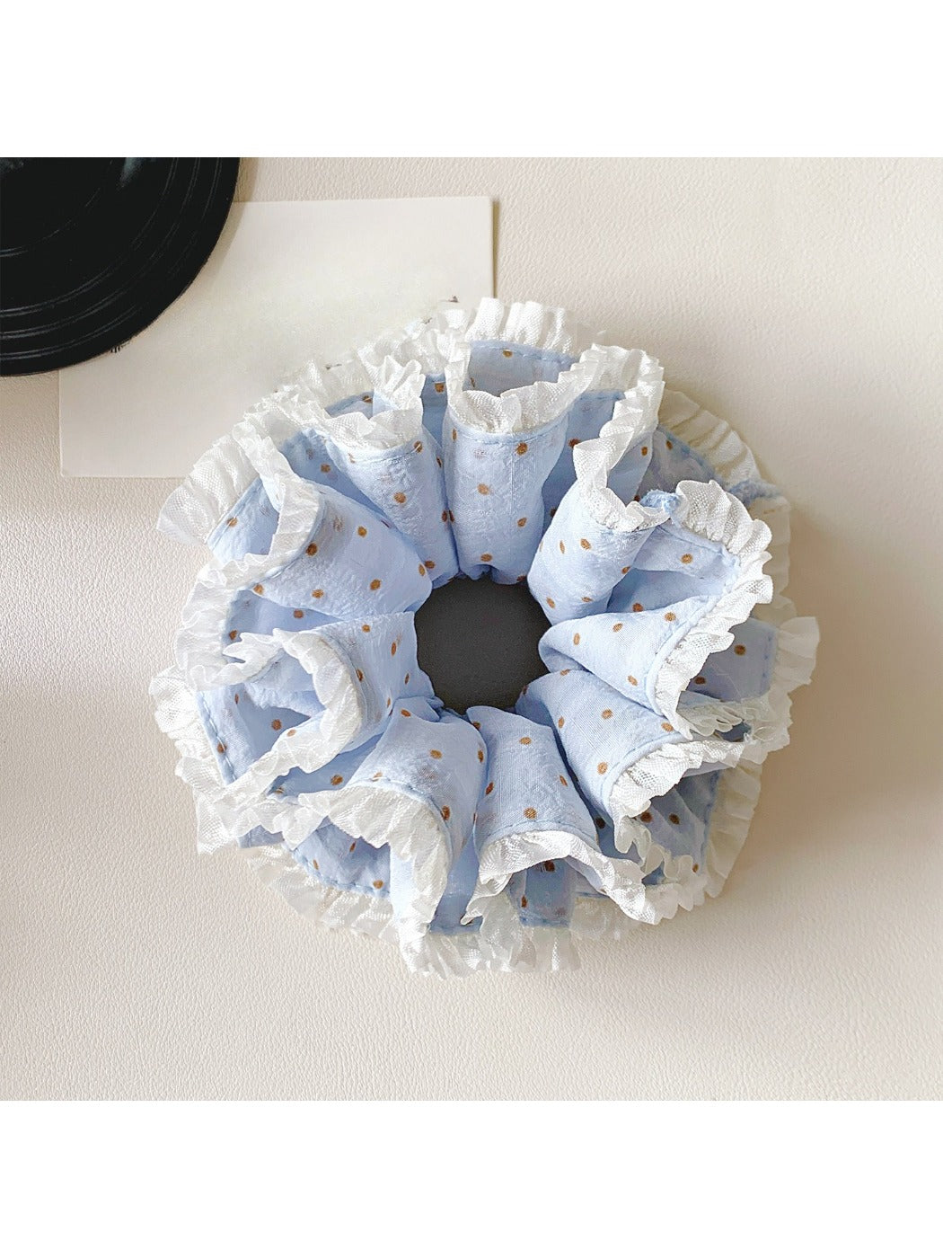 Gifty polka dot double layer lace scrunchie in black and white on a white background