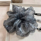 Gifty vintage polka dot scrunchie displayed on a white background showing full circular shape