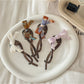Beau - PVC Butterfly Bow Twist Back Hair Clip