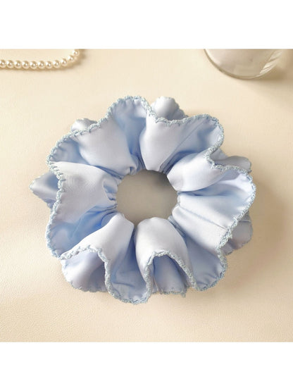 Blue satin double layer scrunchie displayed on a white background