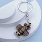 Airplane keychain displayed on a white background with shadow