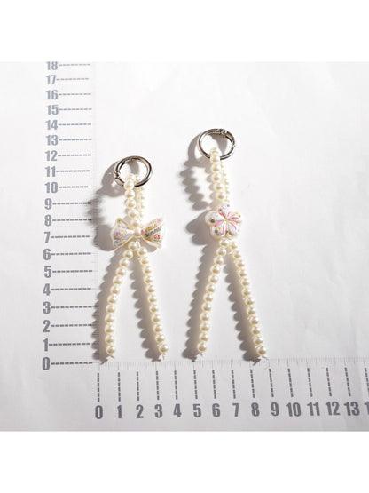 Keypus keychain showing detailed bow shape crafted from small round beads