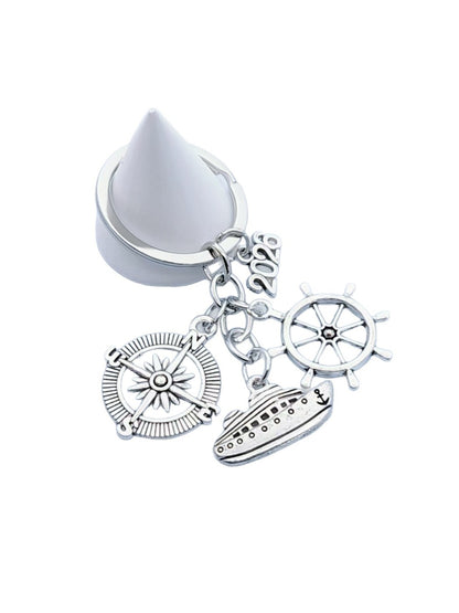 Alloy steamship keychain displayed on a white background with shadows