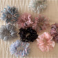 Close-up of vibrant floral pattern on scrunchie fabric