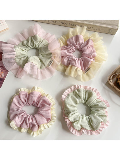 Side view of Gifty Sweet Color Block Tulle Scrunchie highlighting texture and colors