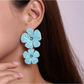 Earedge floral pendant raffia drop earrings styled with casual summer outfit