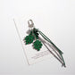 Keypus leaf shaped keychain with intricate leaf vein design on a table