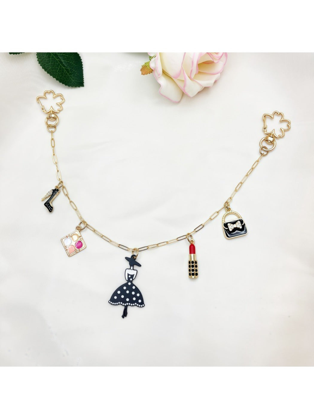 Keypus fashion pendant bag charm with a mix of metal and fabric elements