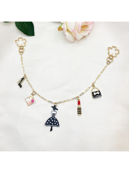 Keypus fashion pendant bag charm with a mix of metal and fabric elements