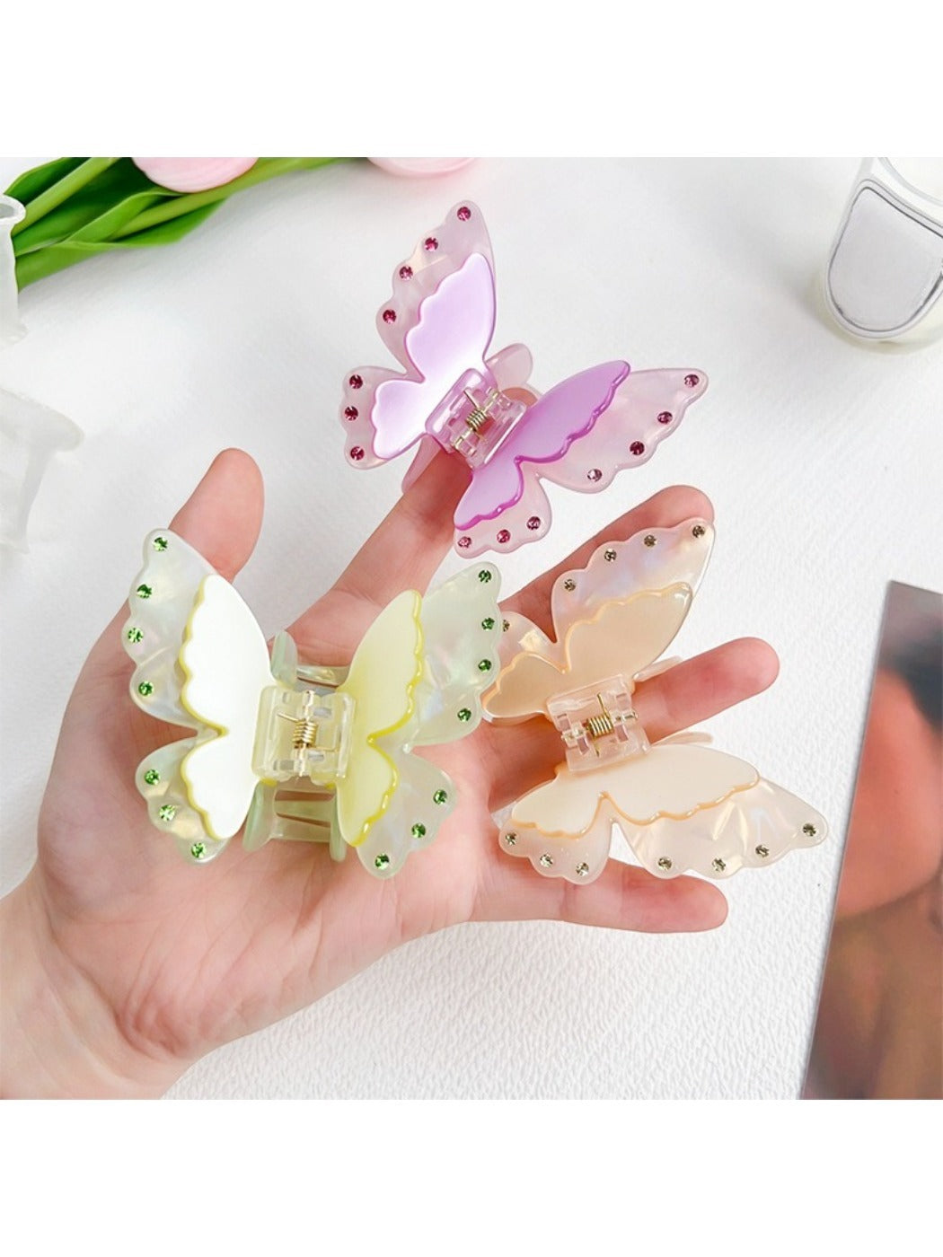 Side view of Beau butterfly claw clip highlighting the two tier structure