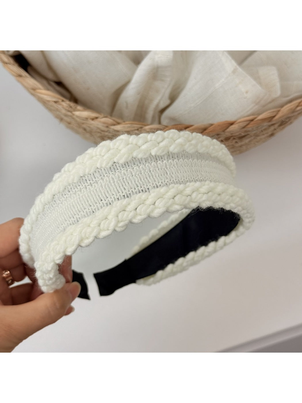 Top view of Gifty headband displaying its symmetrical bow and smooth finish