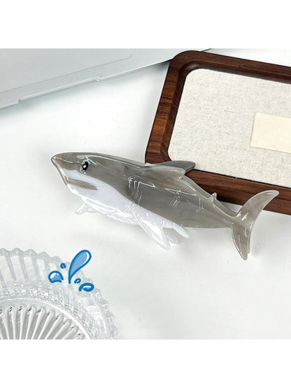 Beau shark shaped hair claw clip securing a ponytail on a model