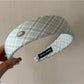 Gifty headband styled with sporty look on model with natural background