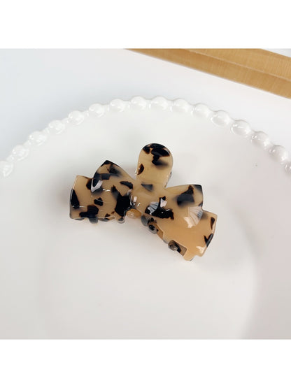 Beau hair claw clip shown from the back with clip hinge visible