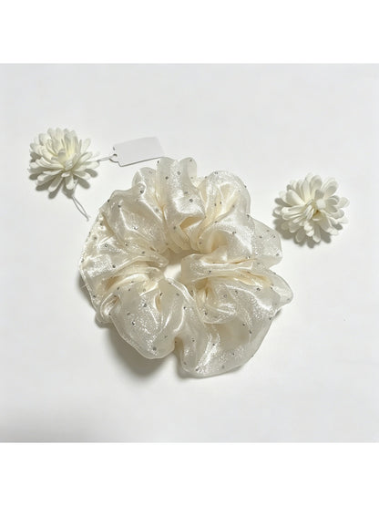 Gifty tulle scrunchie with sparkling rhinestones styled in a ponytail
