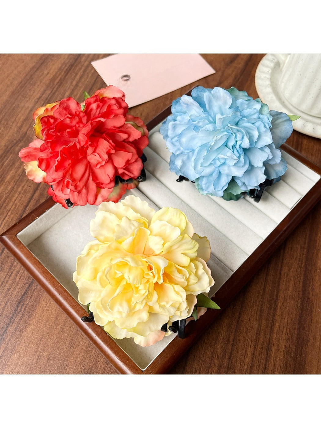 Top view of Beau peony flower claw clip highlighting realistic flower design