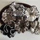 Gifty satin scrunchie worn on a model's wrist as a stylish accessory
