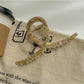 Beau large acetate claw clip placed next to matching hair accessories on table