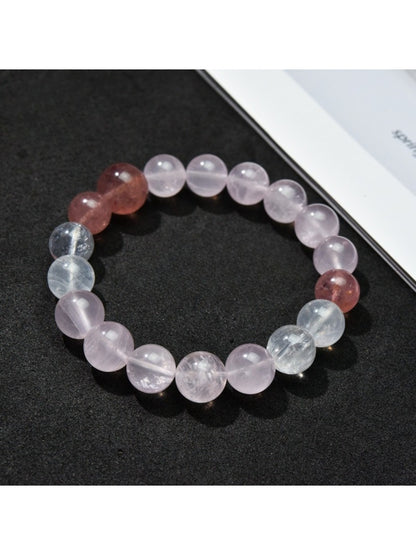 Lovra minimalist color block beaded bracelet with black, white, and beige beads on a wrist