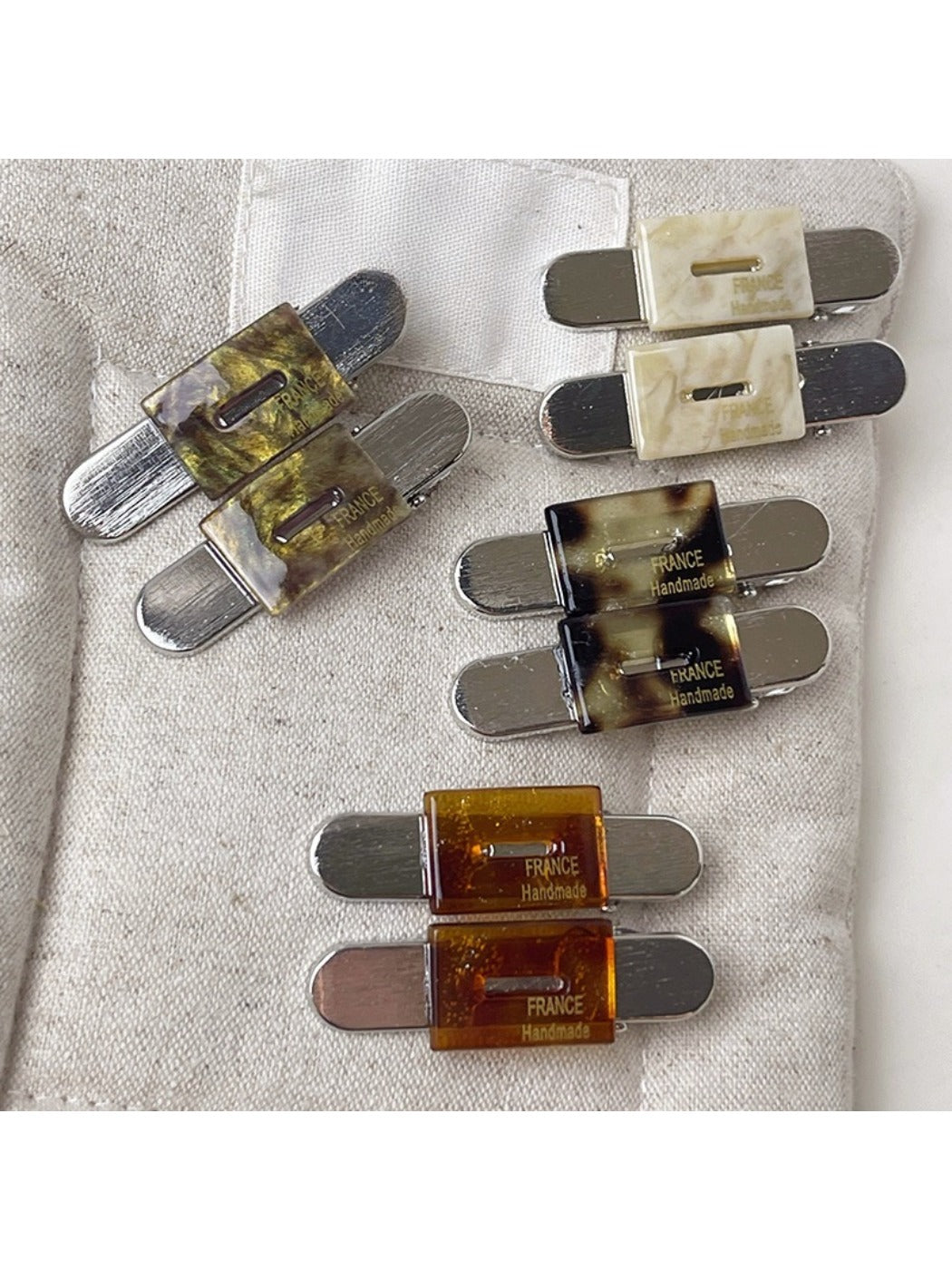 Close-up of Beau vintage flat hair clip showing textured surface detail