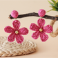 Earedge floral raffia woven vintage drop earrings shown from top angle