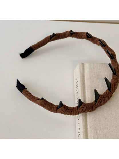 Solid color corduroy headband in muted pink with gathered elastic back
