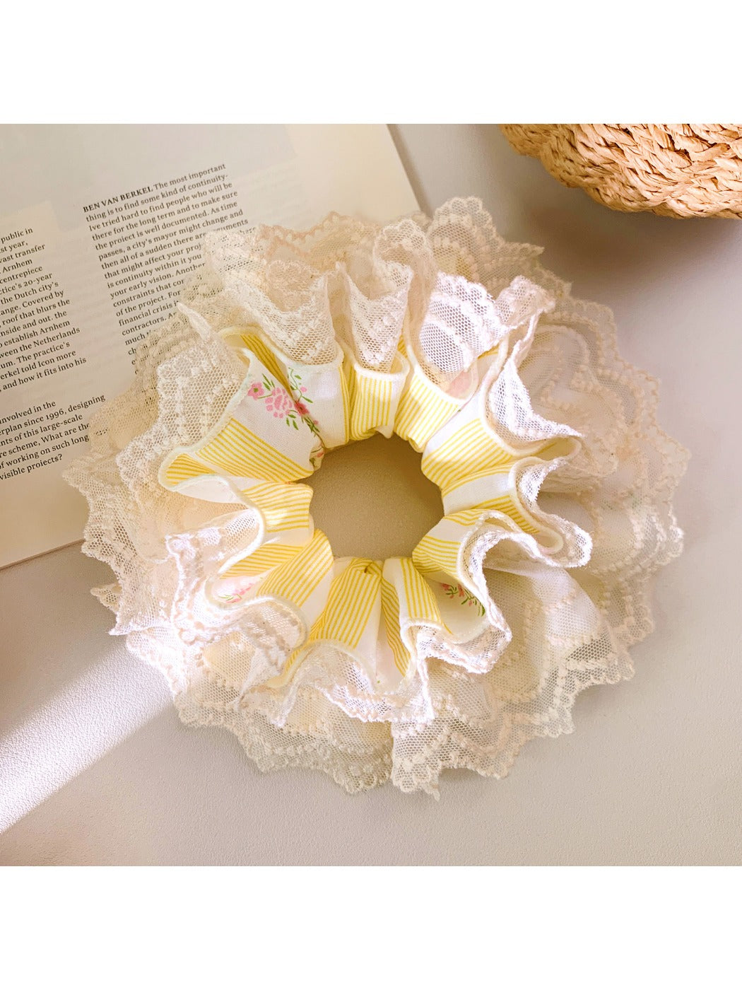 Yellow double layer lace scrunchie on a white background