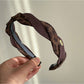 Side view of Gifty retro headband showing its snug fit and pattern