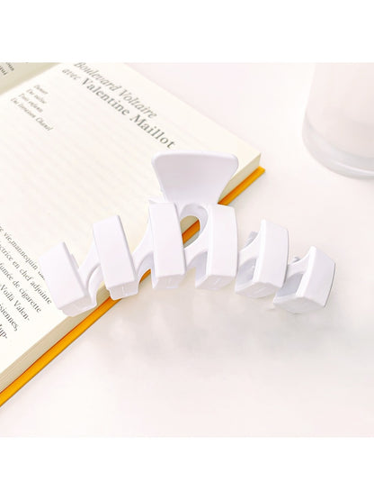 Beau modern wavy hair claw clip displayed open showing claw teeth