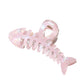 Beau hair clip angled to show glossy finish and color variations