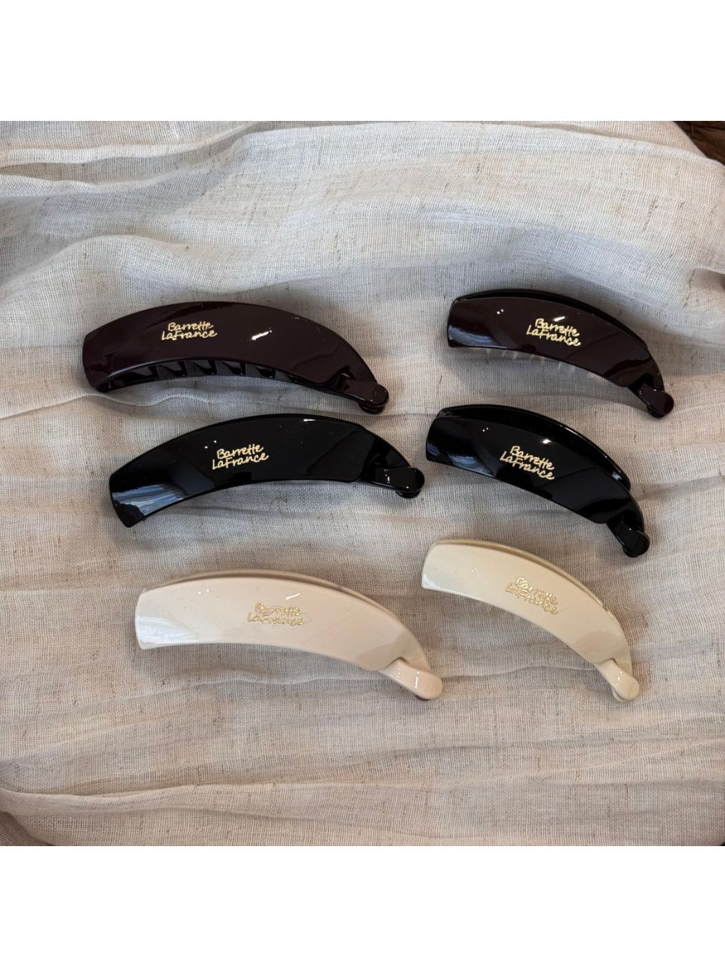 Close-up of Beau minimalist stick hair clip showing smooth matte finish
