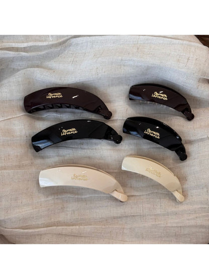 Close-up of Beau minimalist stick hair clip showing smooth matte finish