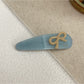 Beau - Bow Embellished Oval Hair Clip