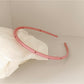 Gifty vintage chic thin headband displayed on white background