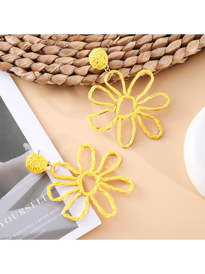 Earedge flower shaped openwork drop earrings shown with matching necklace