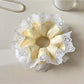 Sweet yellow color block hair scrunchie with soft fabric texture